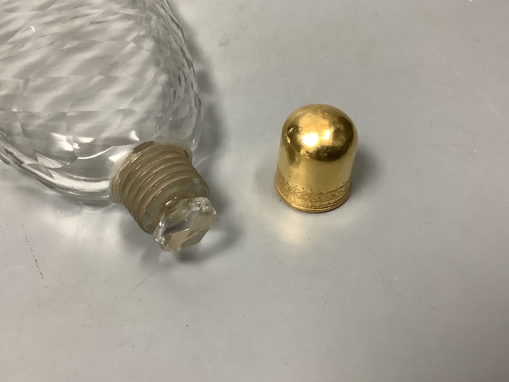 A late 18th/19th century yellow metal topped scent bottle